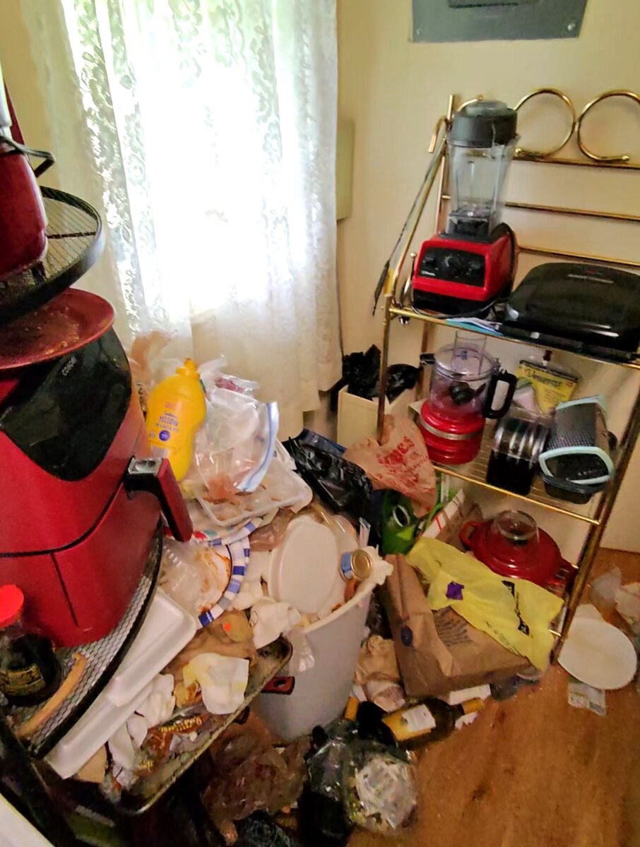 Kitchen before hoarder cleanout contents removal